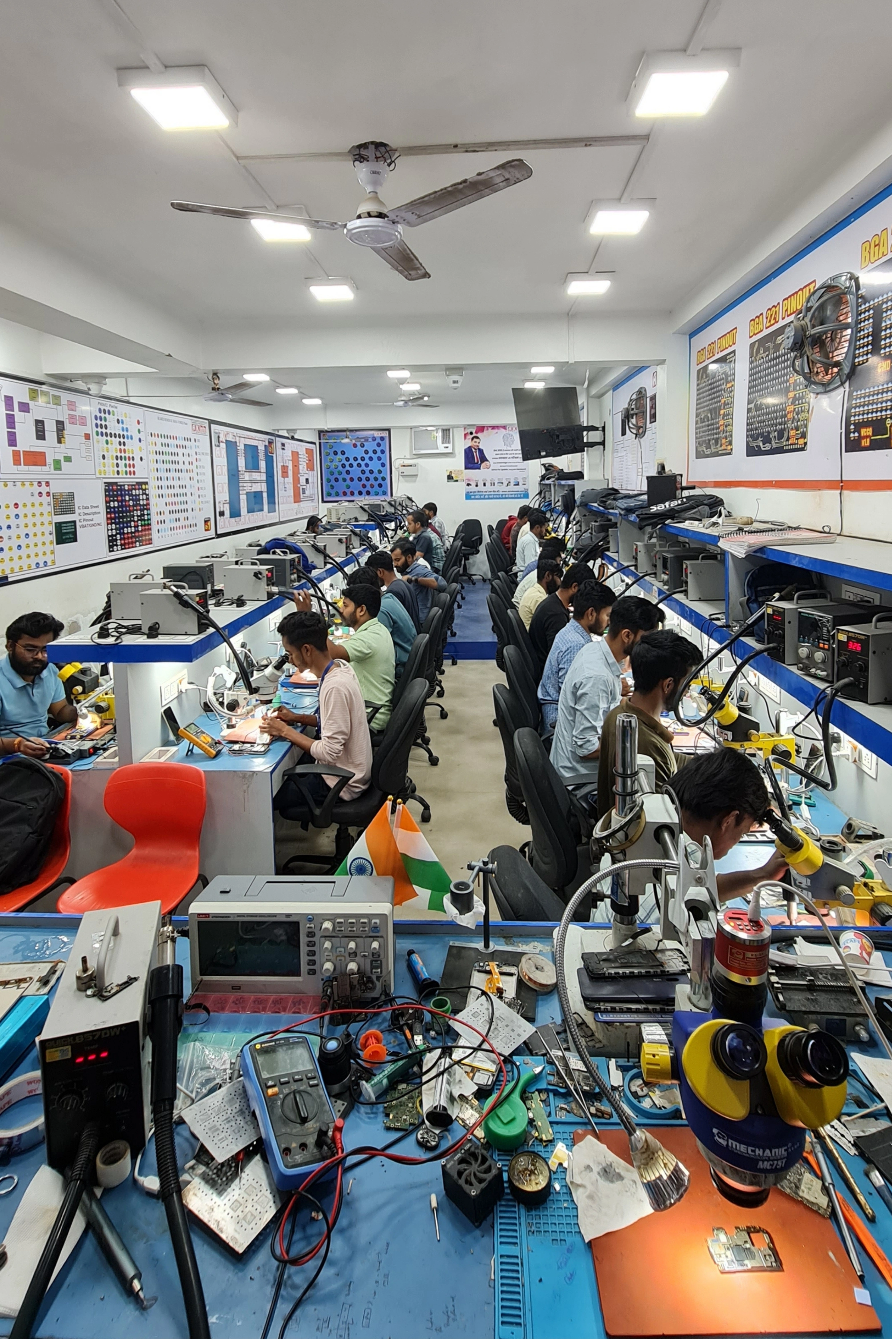 Students learning mobile repairing at AK Info Patna